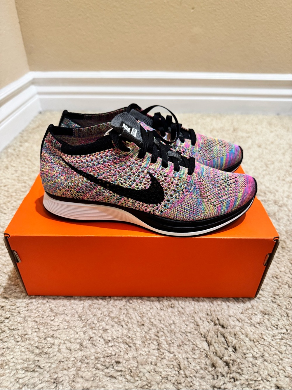 Nike Women’s Multicolor Flyknit Sneakers with Black Swoosh